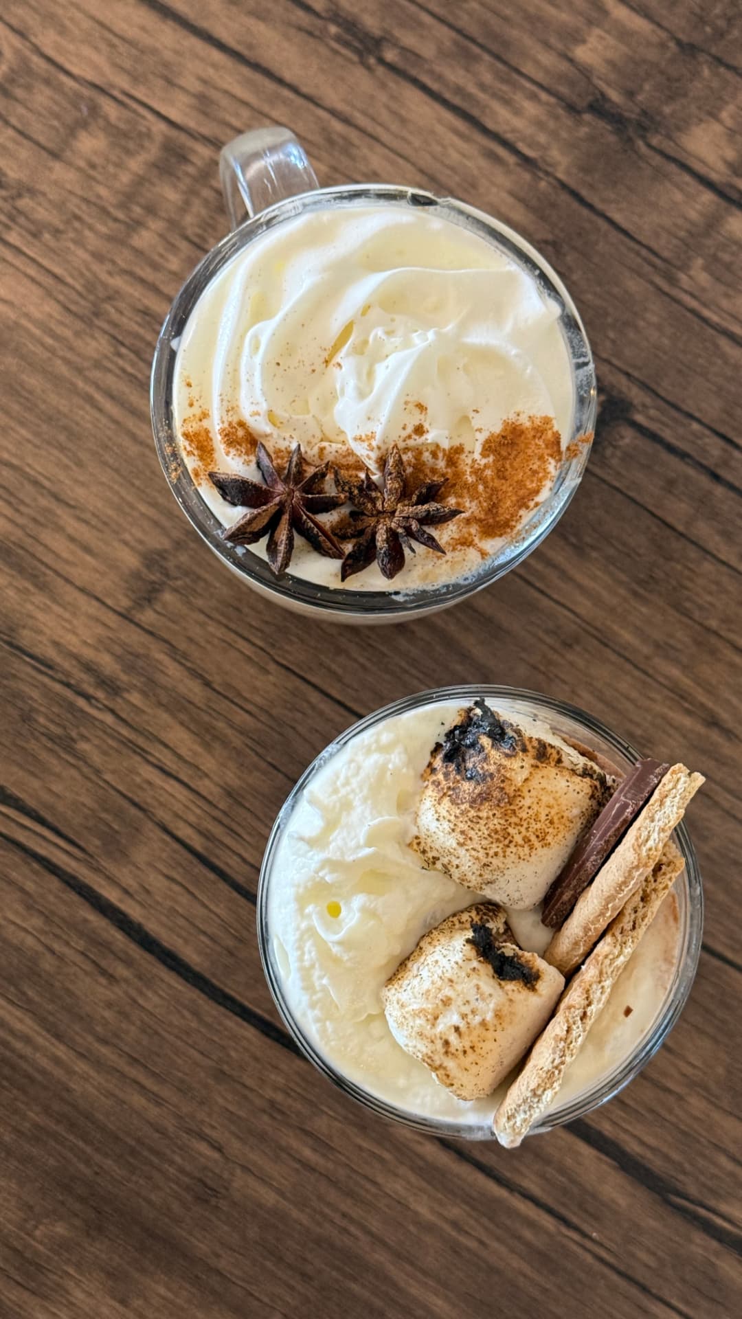 Pumpkin spice and s'more mugs viewed from above